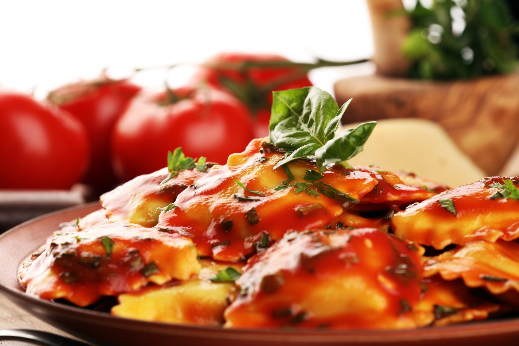 Ravioli with tomato sauce and basil. Fresh homemade ravioli